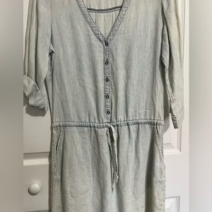 Light denim wash dress. Size S. With pockets and drawstring.